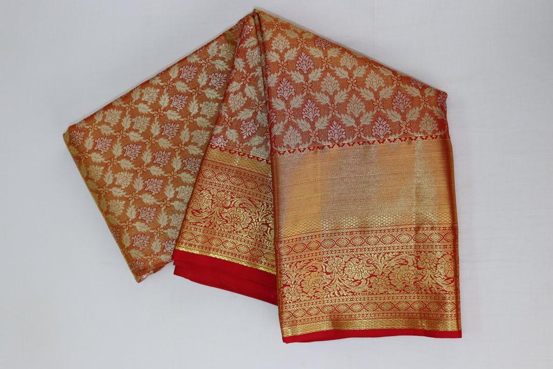 Trendy Orange Tissue Kanjipuram Saree