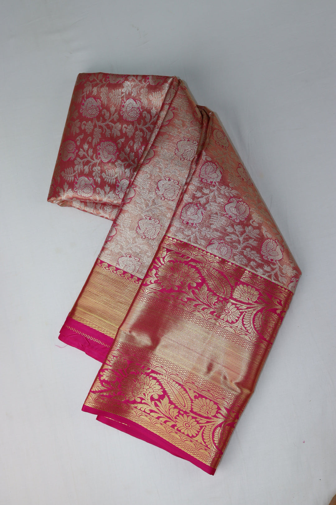 Graceful Peach Tissue Kanjipuram Saree