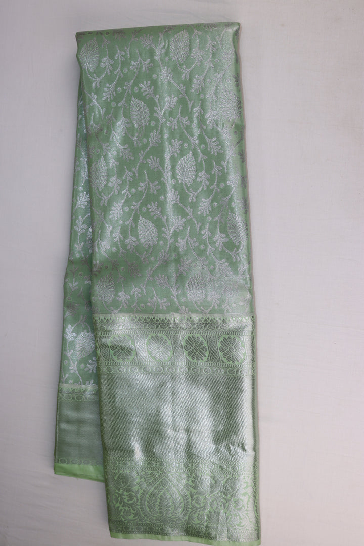 Luxurious Pista Green Tissue Kanjipuram Saree