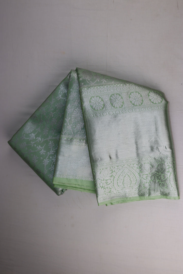 Luxurious Pista Green Tissue Kanjipuram Saree